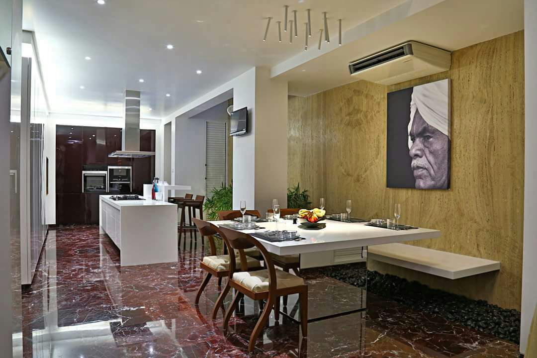 kitchen cum dining room by Chandni Goel Modern | Interior Design Photos & Ideas
