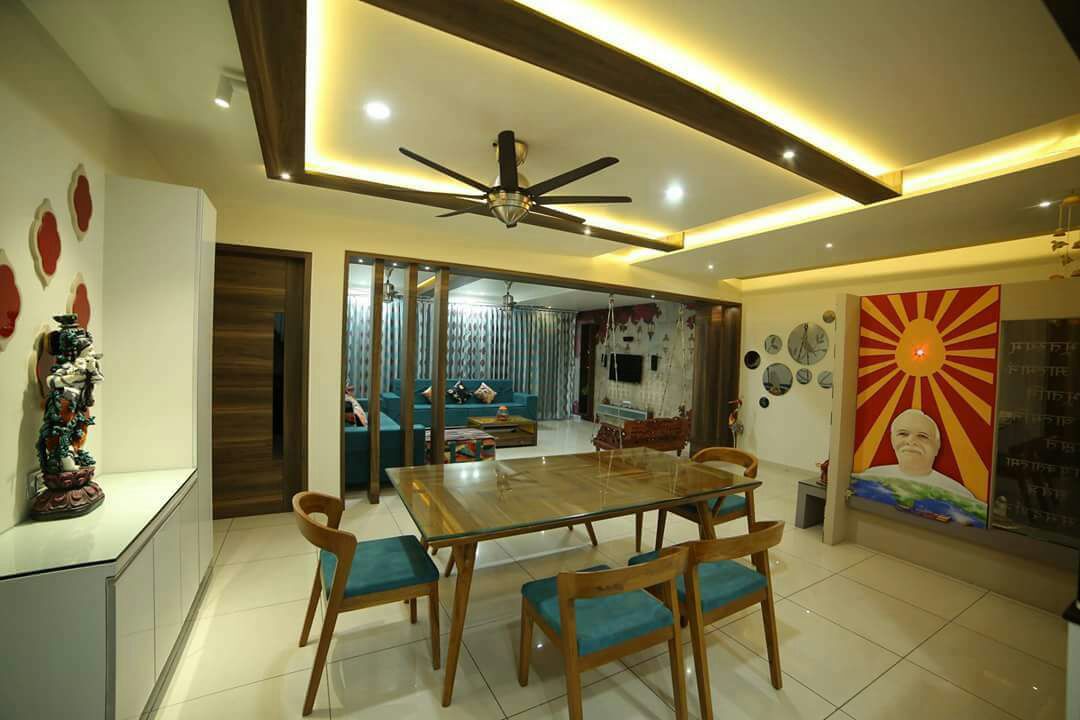 Dinning space with false ceiling and marble flooring with modern display unit by Chandni Goel Dining-room Contemporary | Interior Design Photos & Ideas