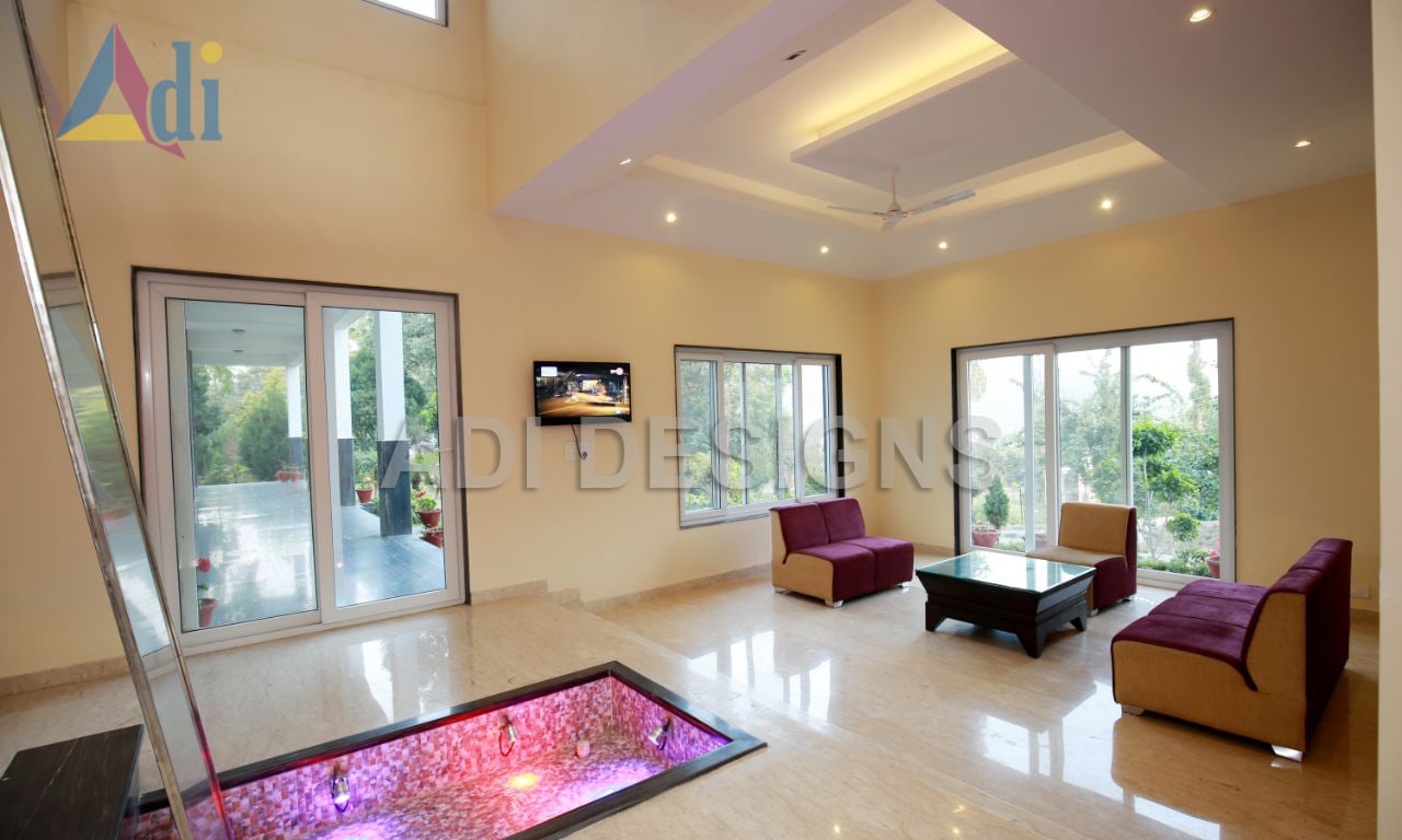 Living space with abstract color wall and maroon sofa by Vishal Arora Living-room Modern | Interior Design Photos & Ideas
