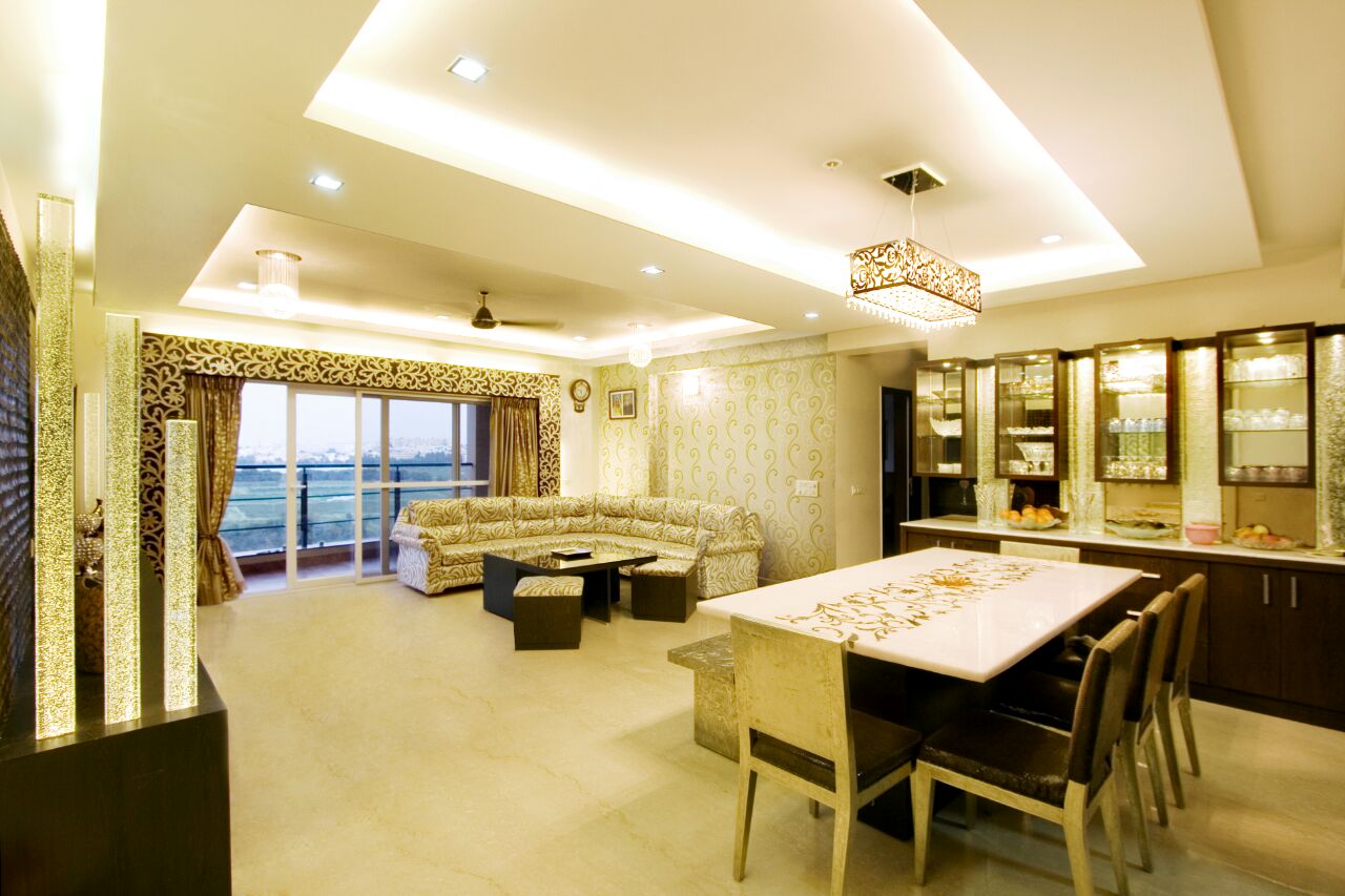 Well Lit Dining Area with Designed Hanging Lights In The Living Room by Yogendra Garg Dining-room Contemporary | Interior Design Photos & Ideas