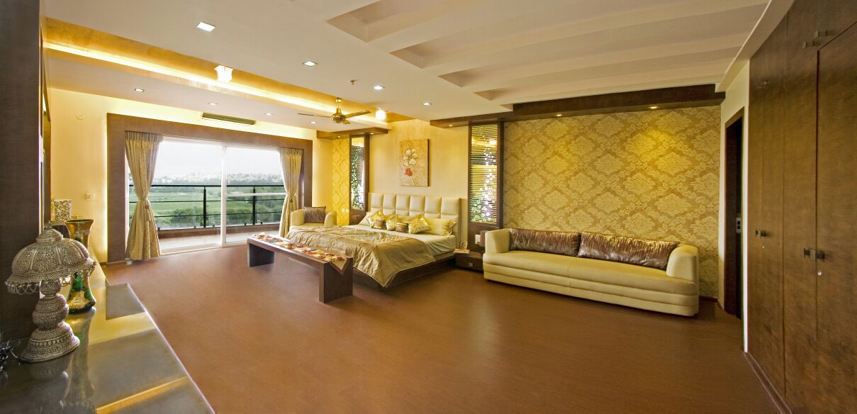 Cream Sofa Set In A Golden Themed Bedroom with Wooden Flooring by Yogendra Garg Bedroom Contemporary | Interior Design Photos & Ideas