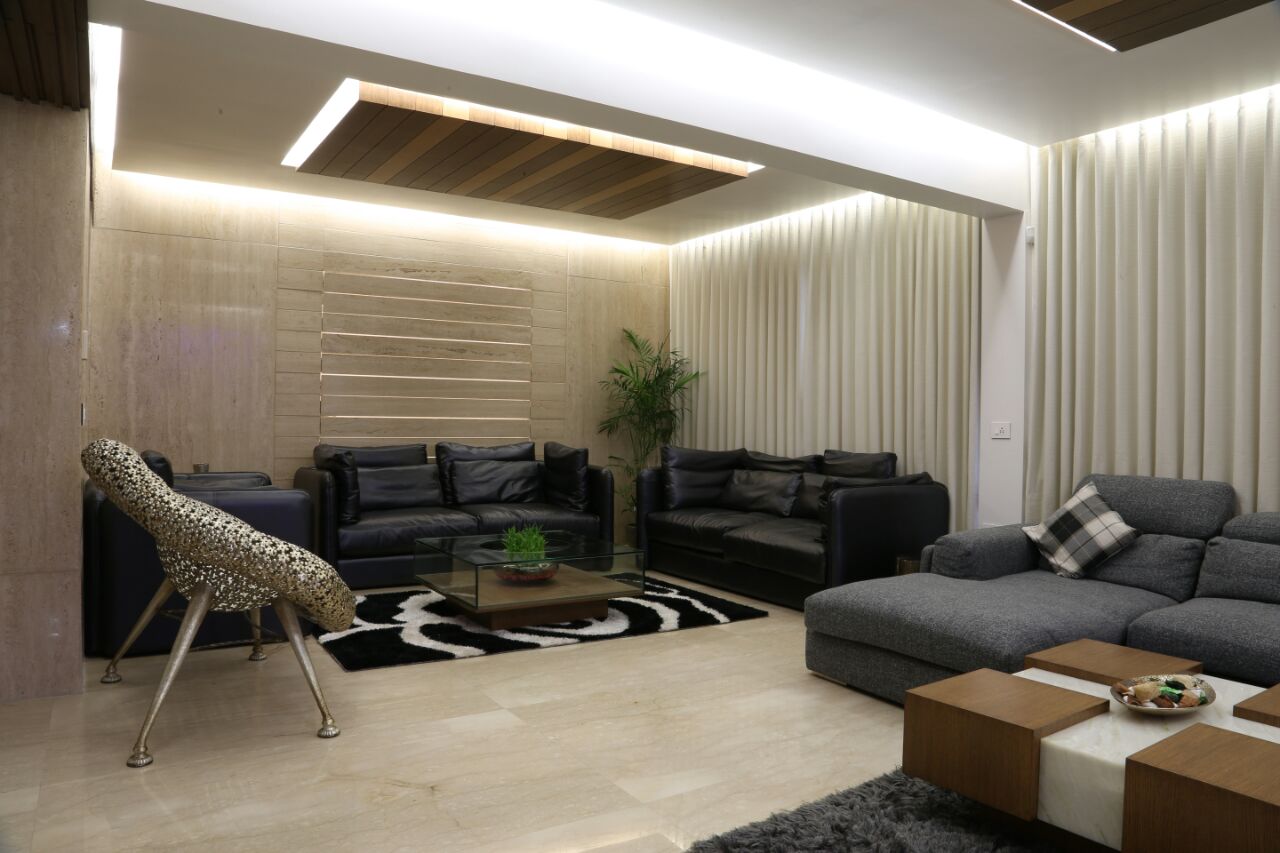 Black Leather Sofas And Glass Top Table by Devang Shah Living-room Contemporary | Interior Design Photos & Ideas