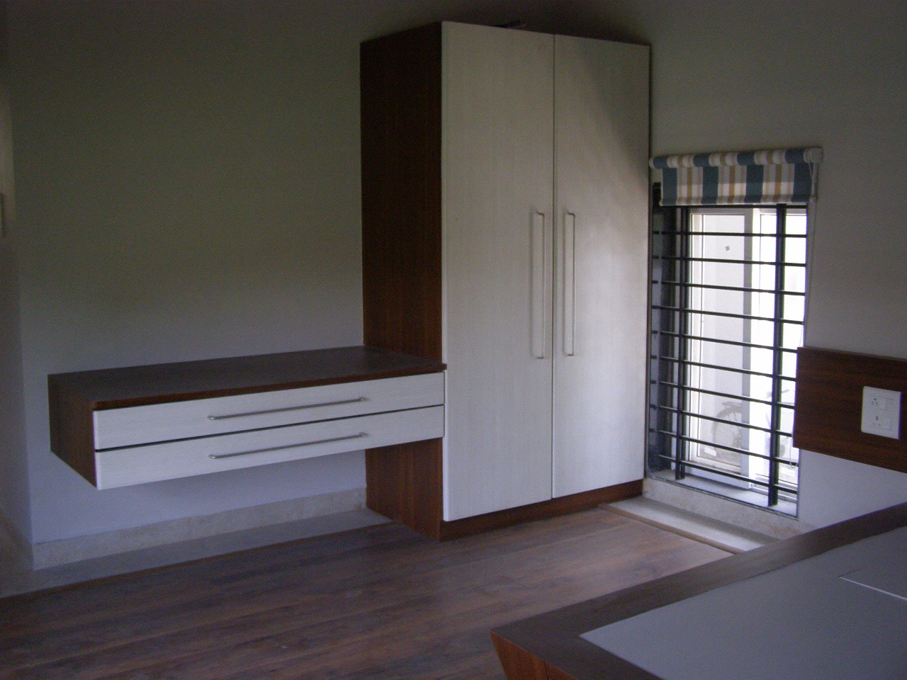 Wooden flooring with wardrobe by Richa Jindal Contemporary | Interior Design Photos & Ideas