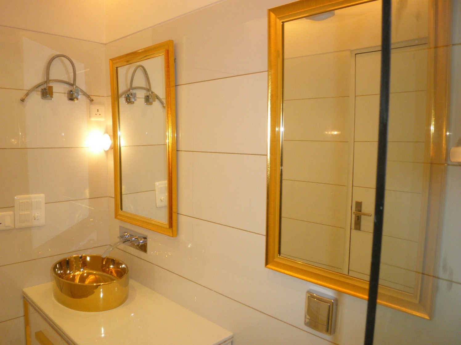 Navajo White Bathroom With Golden Touch by UDC Interiors Bathroom Minimalistic | Interior Design Photos & Ideas