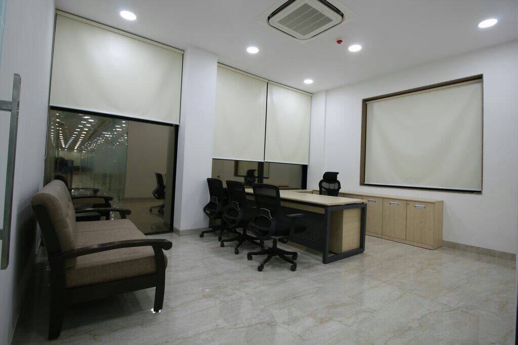 Office With Brown Cushioned Sofa by Rimpy Shah Eclectic | Interior Design Photos & Ideas