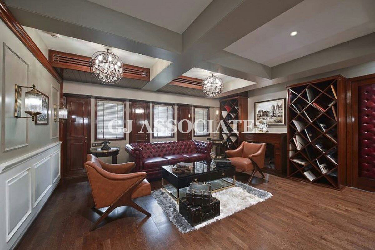 Wooden Theme Living Room With Tan Leather Chairs by Gaurang Jawle Living-room Modern | Interior Design Photos & Ideas