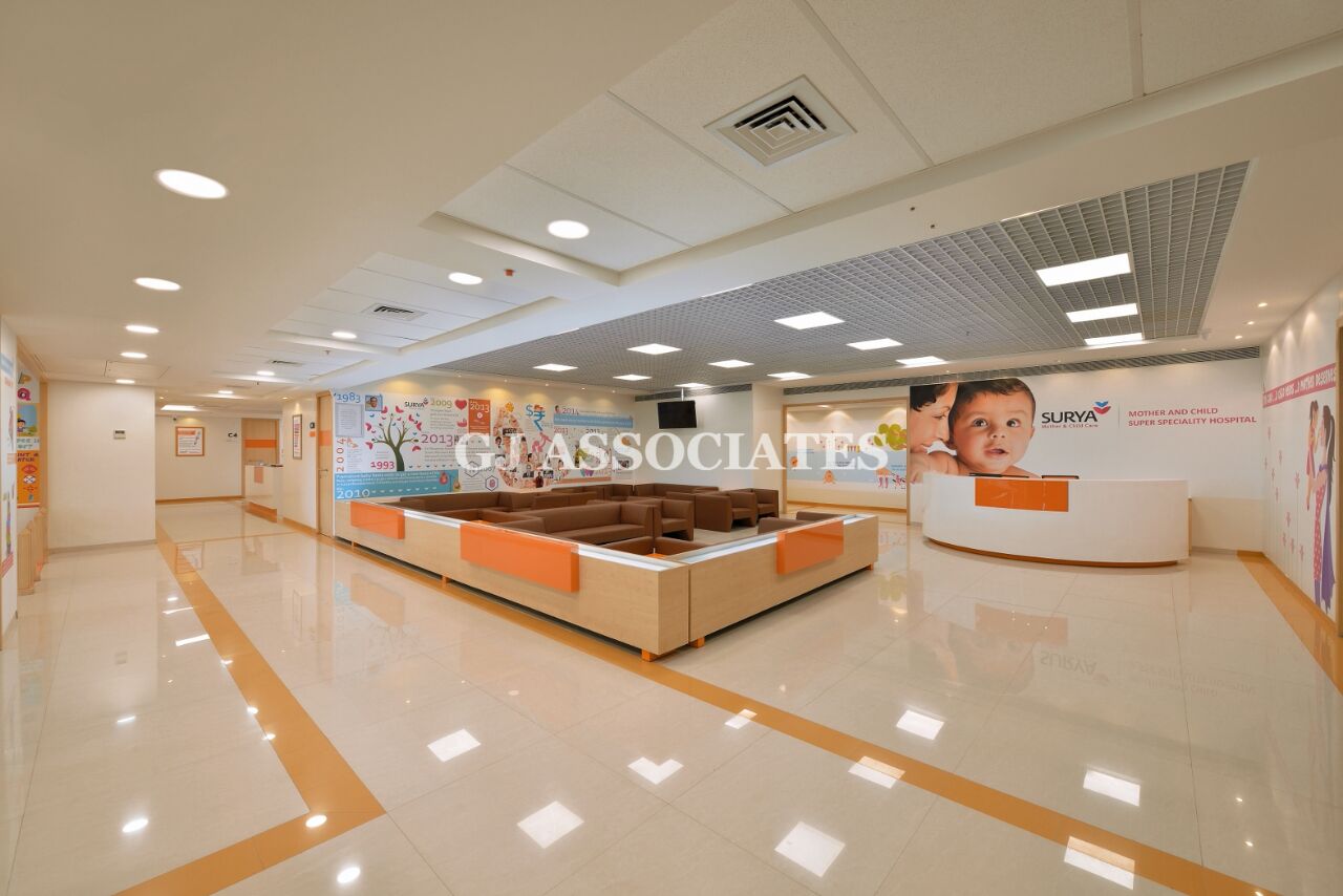 White Themed Hospital Waiting Room With White Glossy Tiles by Gaurang Jawle Modern | Interior Design Photos & Ideas