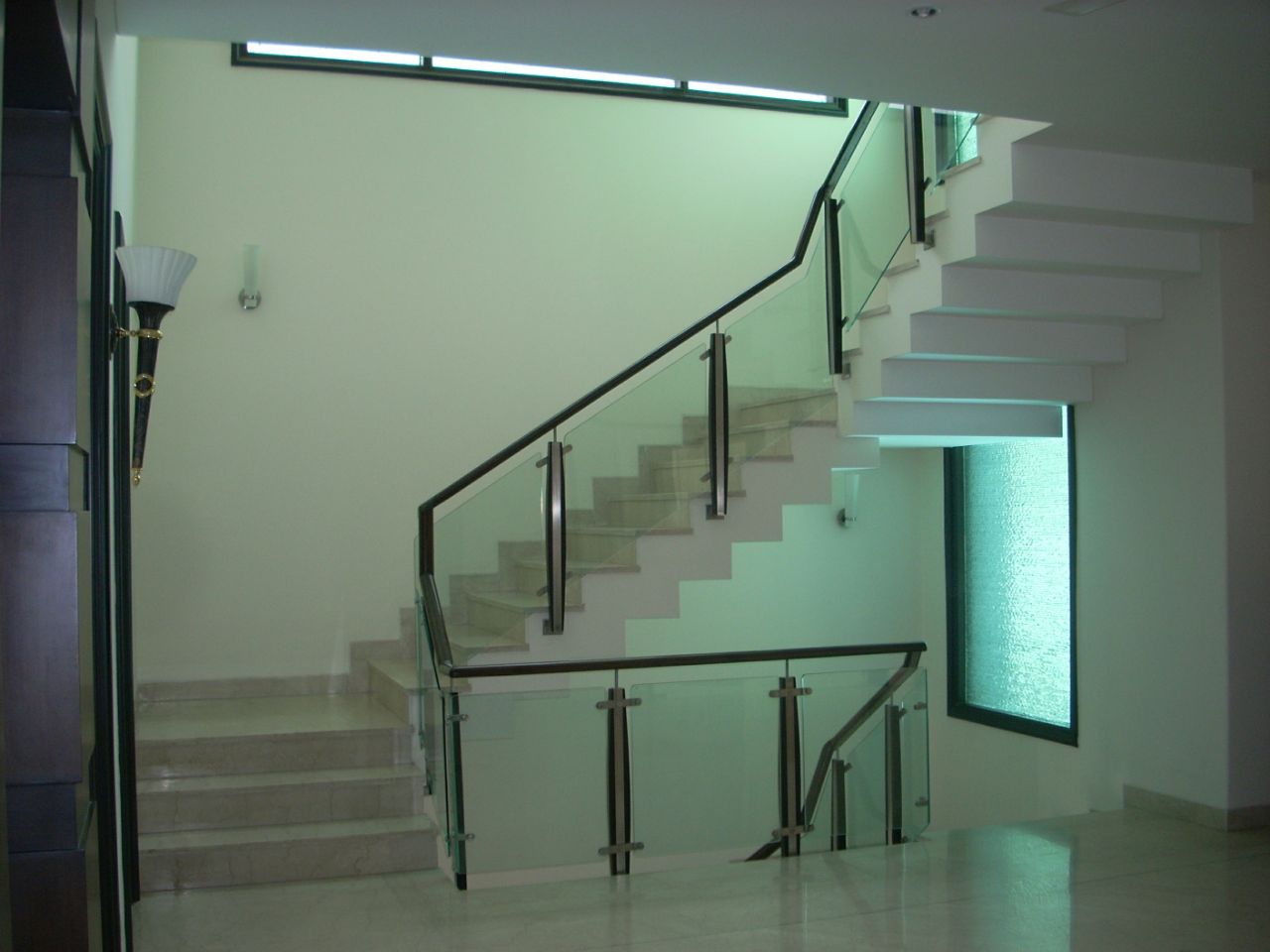 White Themed Staircase Decor by Madhu Kailashi Indoor-spaces Modern | Interior Design Photos & Ideas