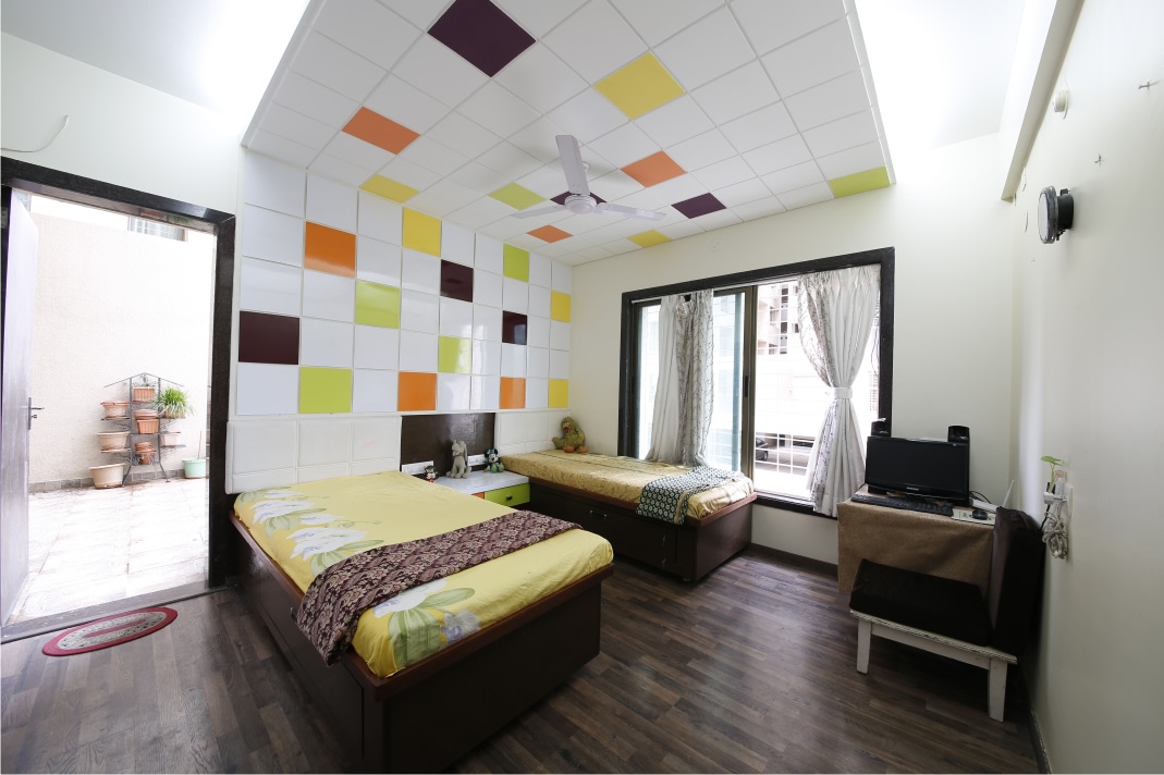 Ebony Wood Single Beds and Multicolured Big Mosaic tiles by Rajas Joshi Bedroom Modern | Interior Design Photos & Ideas
