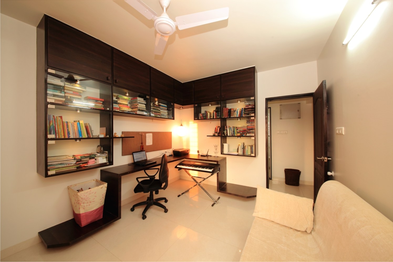 Study Room With Black Task Chair and Wooden Book Cabinet by Rajas Joshi Modern | Interior Design Photos & Ideas