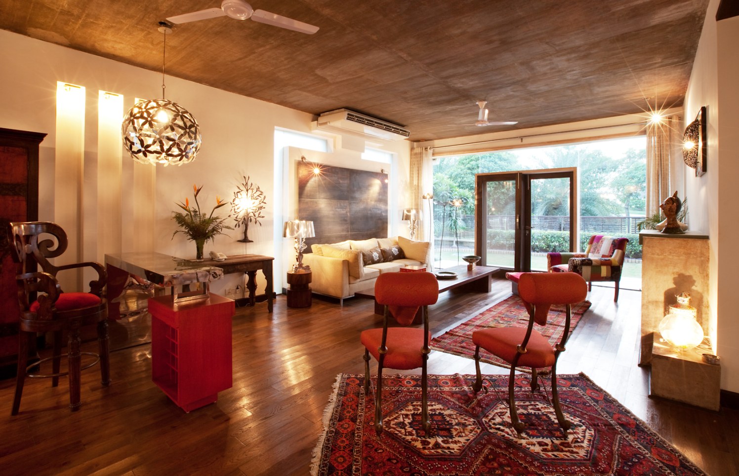 Living Room With Wooden Flooring And Mid Century Sofas by narayan moorthy Living-room Eclectic | Interior Design Photos & Ideas