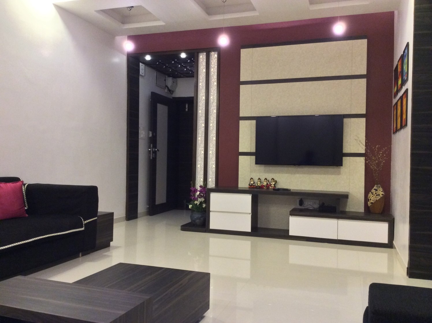 Living space with marble flooring and tv unit by Vatsal Hadvani Living-room Contemporary | Interior Design Photos & Ideas