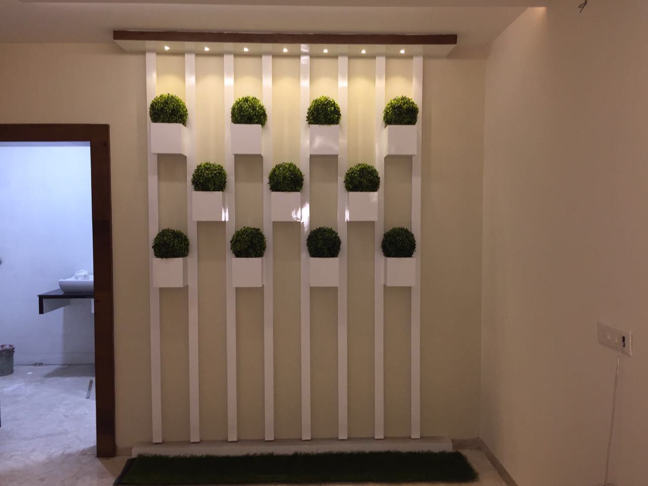 Hallway Decor With Hanging Mini Vases and Recessed Built-in Light by Shravan Hendre Indoor-spaces Modern | Interior Design Photos & Ideas