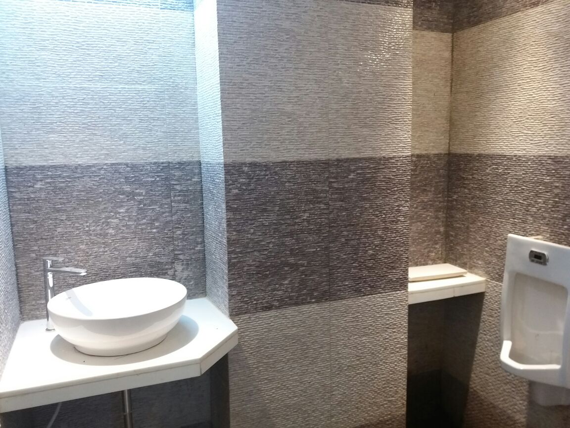 Office Toilet Room with Wash and Urinal by Roshan Ashta