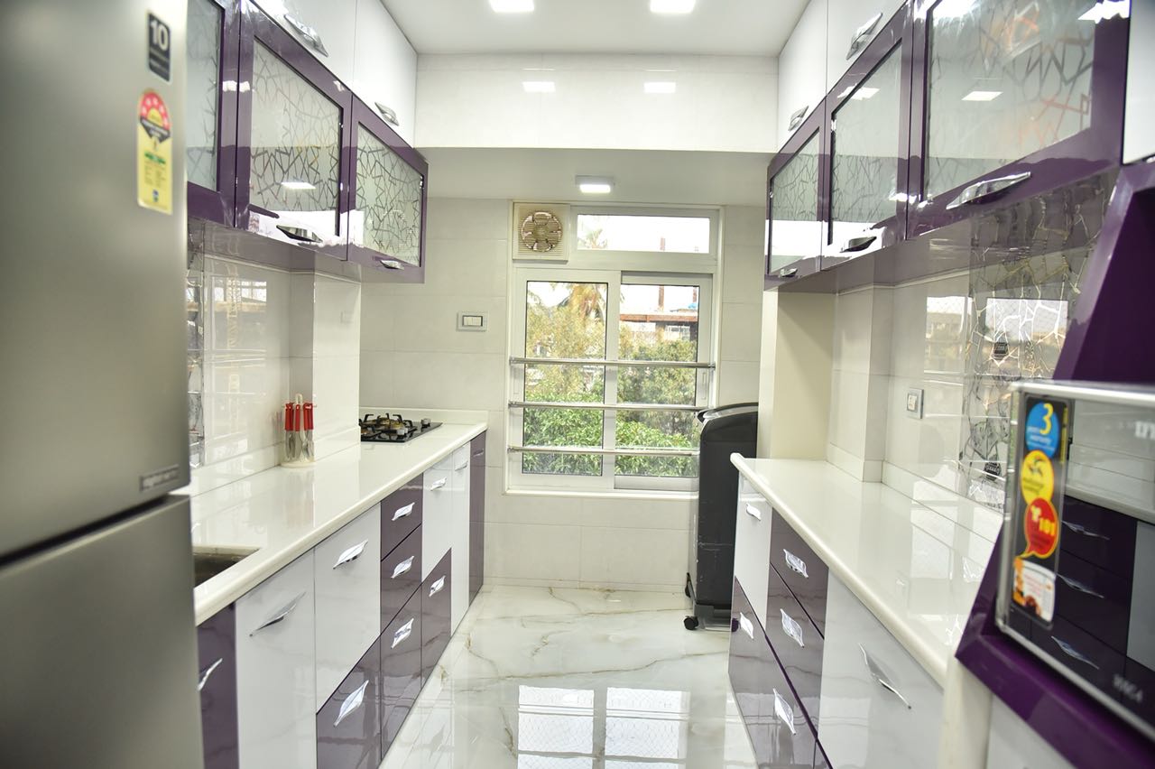 White Themed Kitchen With White and Brown Cabinets by Chirag Sunil Bhandari Modular-kitchen Modern | Interior Design Photos & Ideas