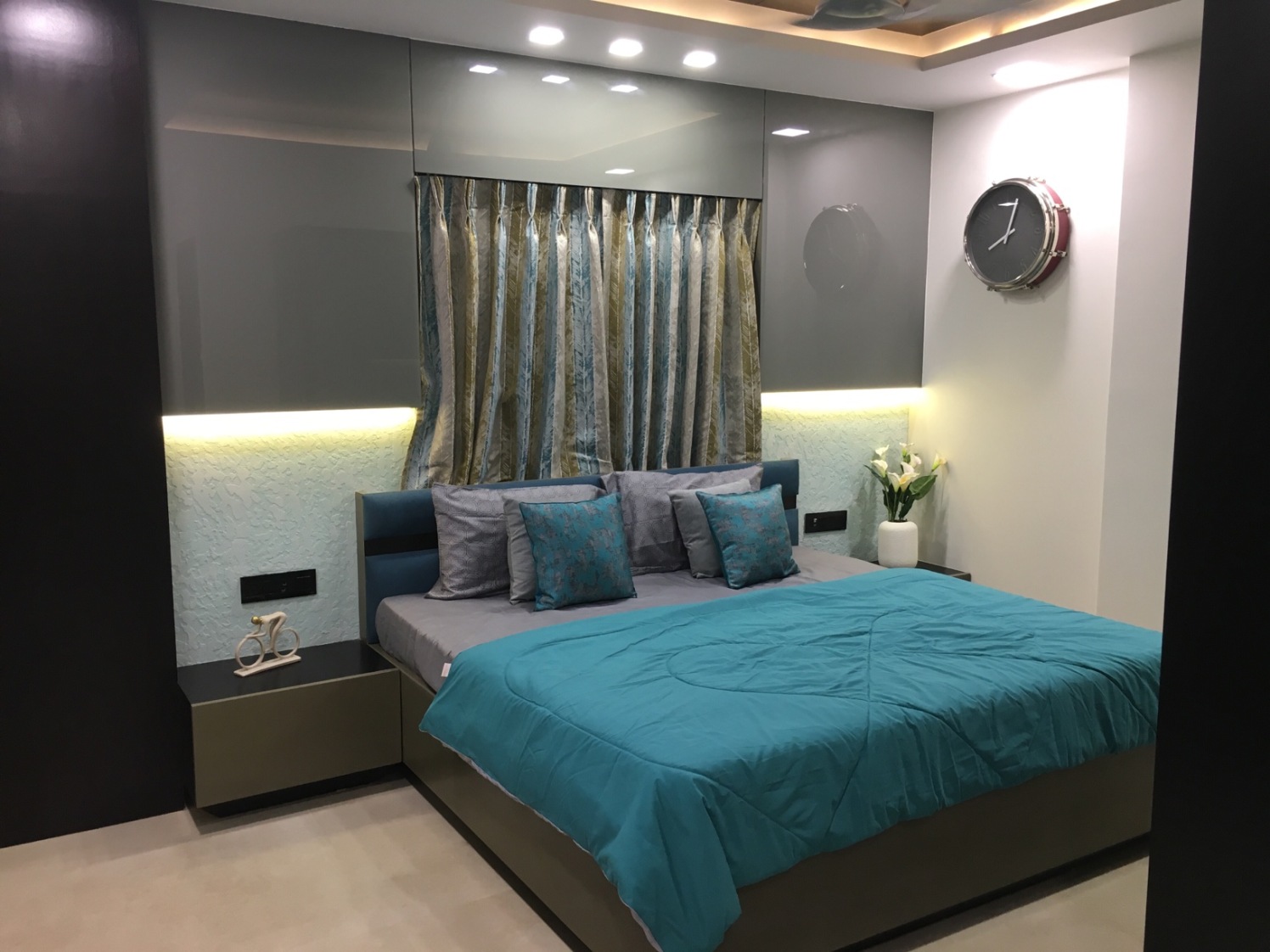 Low Rise Cushioned Bed And Mocha brown Side Table by Dhwani Patel Bedroom Contemporary | Interior Design Photos & Ideas