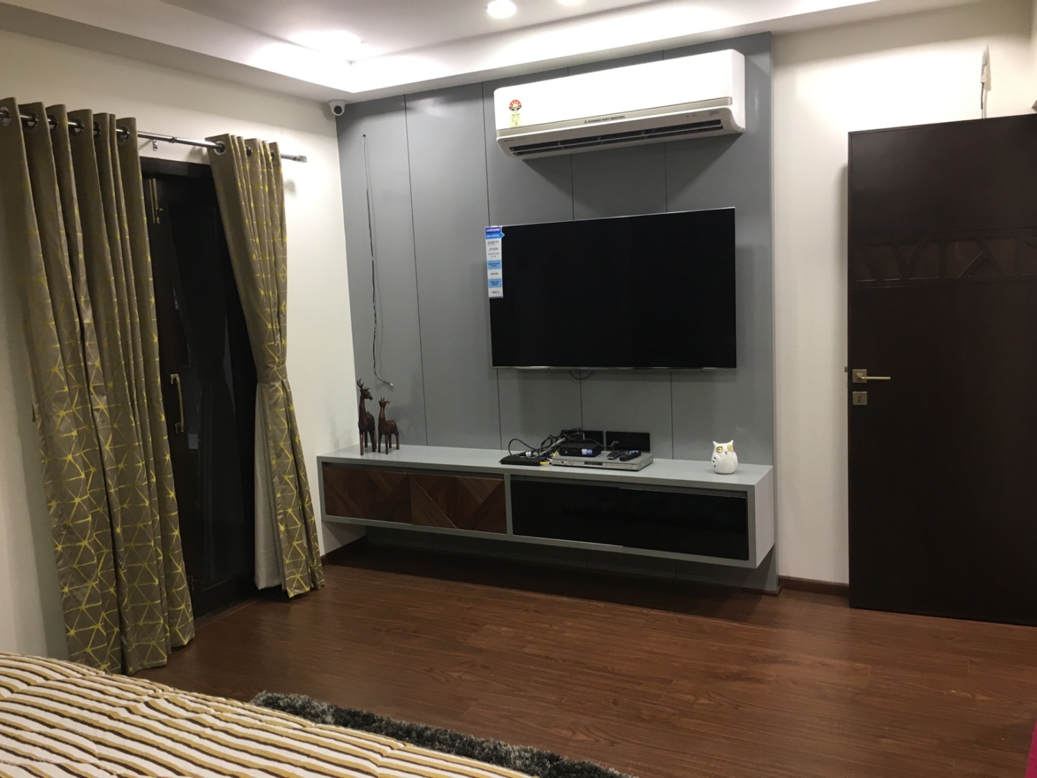 Grey Themed Study Table With Brown Wooden Cabinets by Dhwani Patel Contemporary | Interior Design Photos & Ideas