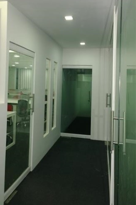 Office hallway by Ameer Tumbi Modern | Interior Design Photos & Ideas