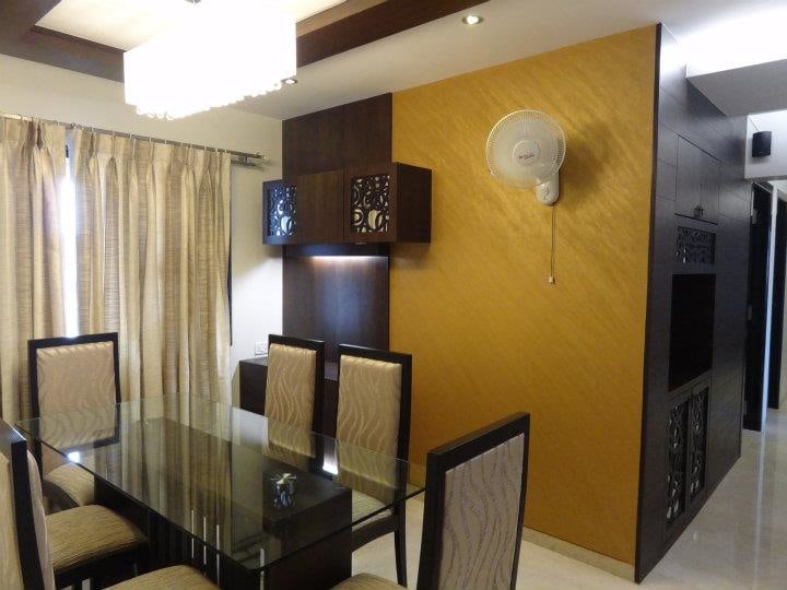 Dining Room With High Back Chairs And Pale Yellow Walls by Gunjan Mehrotra Dining-room Modern | Interior Design Photos & Ideas