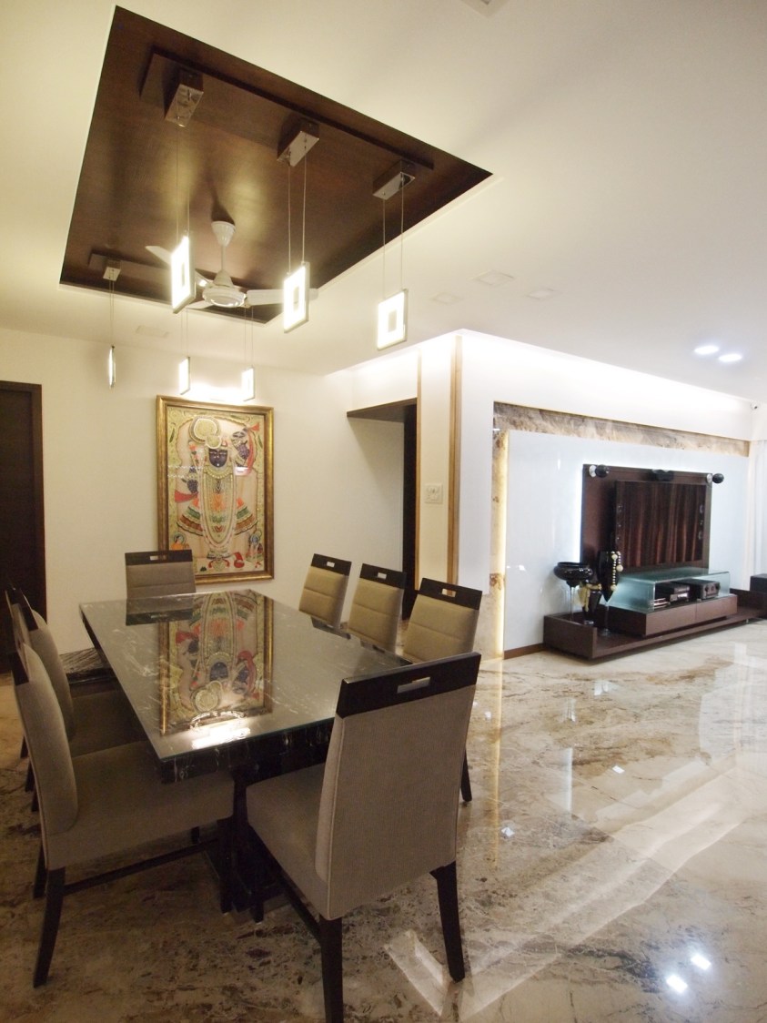 Dining Room With Brown Cushioned Chairs And Square Lights by Janaki Kumar Raut Dining-room Contemporary | Interior Design Photos & Ideas