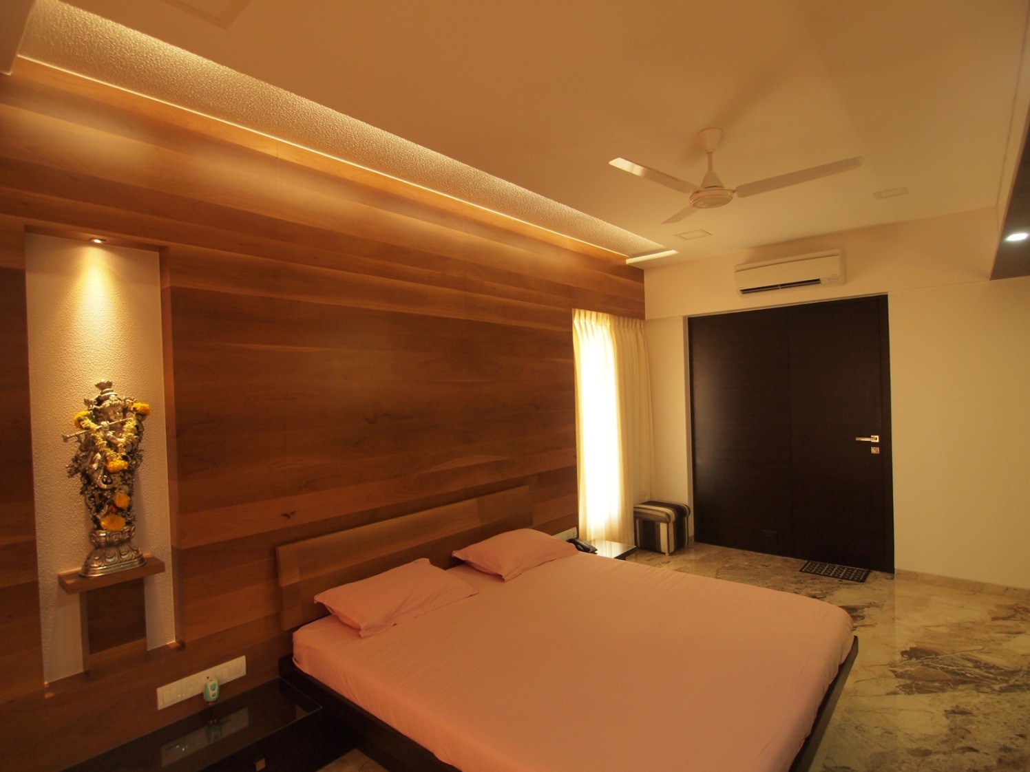 Simple Bedroom With Low Rise Wooden Bed by Janaki Kumar Raut Bedroom Contemporary | Interior Design Photos & Ideas