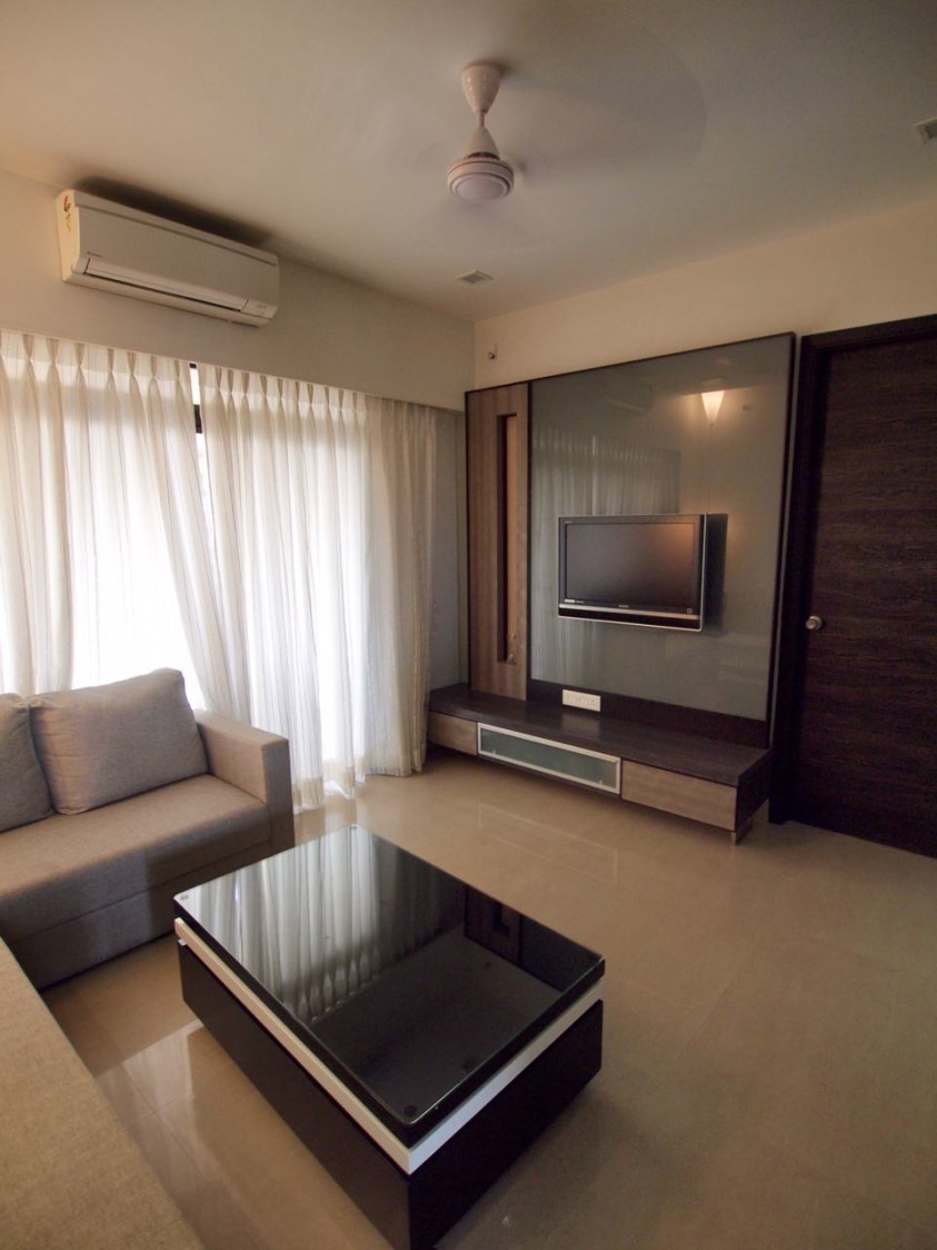Living Room With Black Centre Table by Janaki Kumar Raut Living-room Contemporary | Interior Design Photos & Ideas