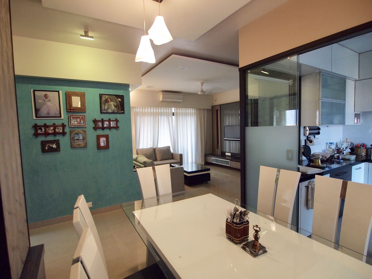 Dining Room With Pendant Lights by Janaki Kumar Raut Modular-kitchen Contemporary | Interior Design Photos & Ideas