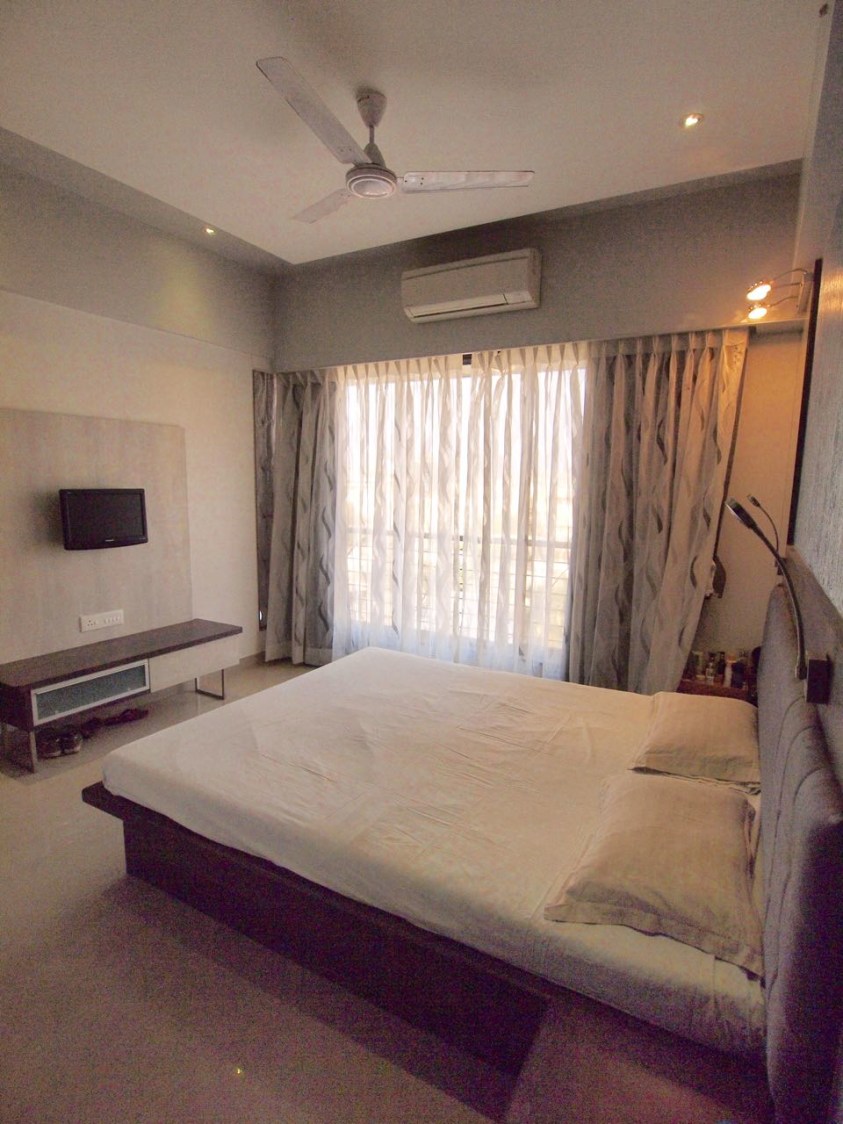 BedroomWith Low Rise Wooden Bed by Janaki Kumar Raut Bedroom Contemporary | Interior Design Photos & Ideas