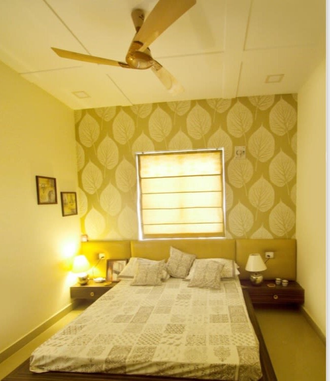 Olive green themed room with Beige leaf print walls by Sarath Sasi P Bedroom Contemporary | Interior Design Photos & Ideas