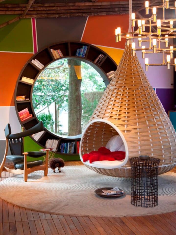 Vintage Living Space With Hanging Sofa And Round Book Shelf by purvesh shelat Living-room Vintage | Interior Design Photos & Ideas