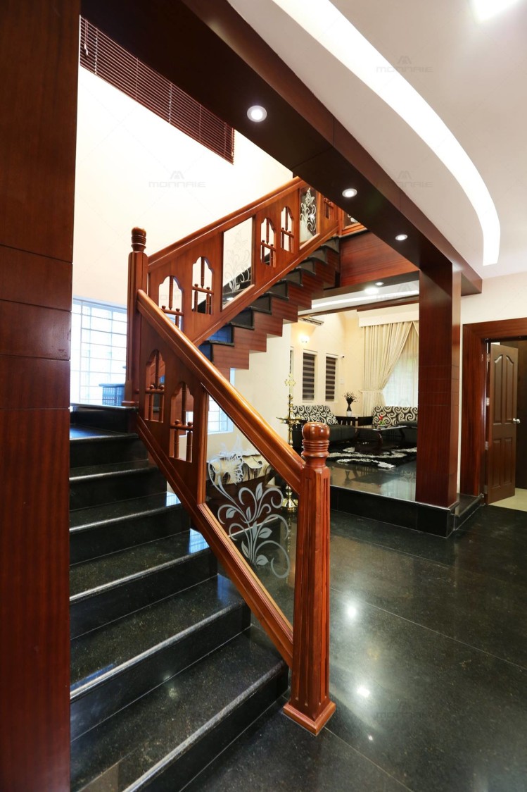 Black Marble Flooring Staircase with Wooden Hand Rest by Monnaie Architects Indoor-spaces Contemporary | Interior Design Photos & Ideas