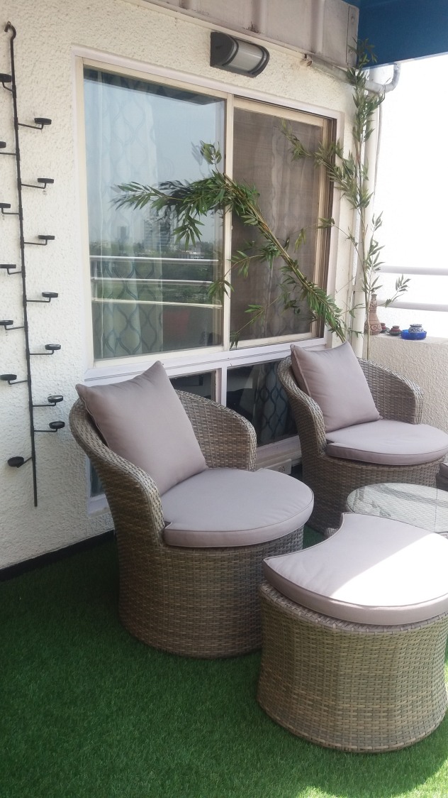 Grasses And Patio Chairs In A Balcony by Global Associates Open-spaces Contemporary | Interior Design Photos & Ideas