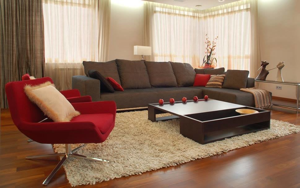 Buff Shaded Living Room With Red Chair And Coyote Sofa by JS Interior Decorator & Designer Living-room Contemporary | Interior Design Photos & Ideas