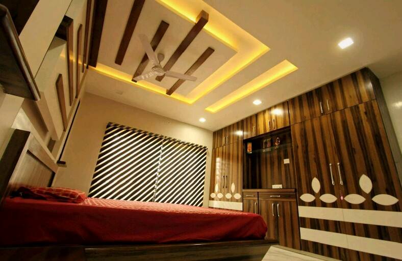 Buff Shaded Bedroom With Antique Oak Wardrobe by JS Interior Decorator & Designer Bedroom Modern | Interior Design Photos & Ideas