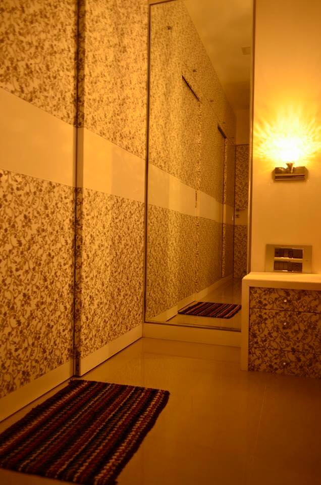 Hallway with golden touch by K D Mistry Interior Indoor-spaces Minimalistic | Interior Design Photos & Ideas