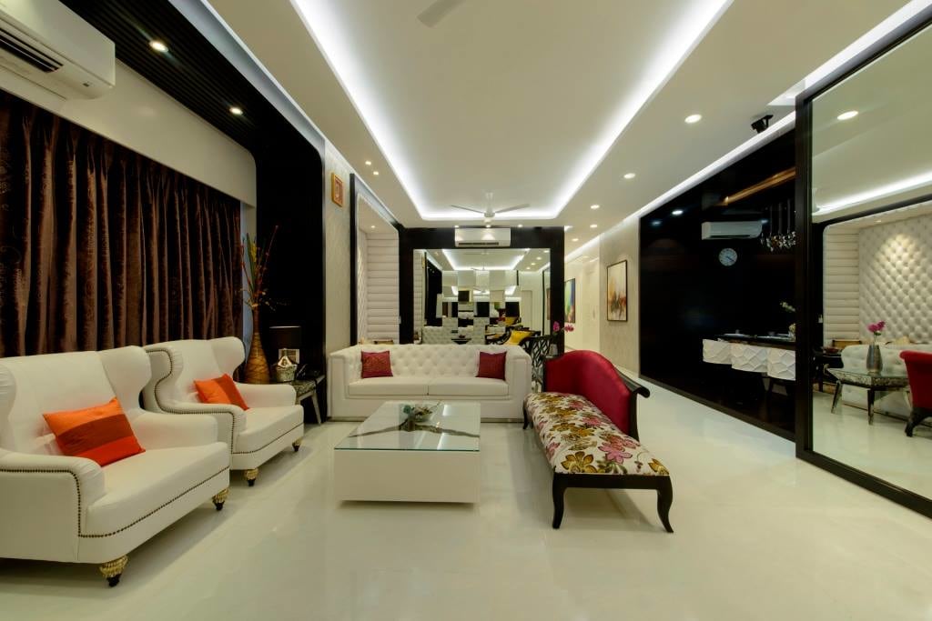 White Winged Chairs With Floral Printed Diwan by Sagar Shah Living-room Minimalistic | Interior Design Photos & Ideas