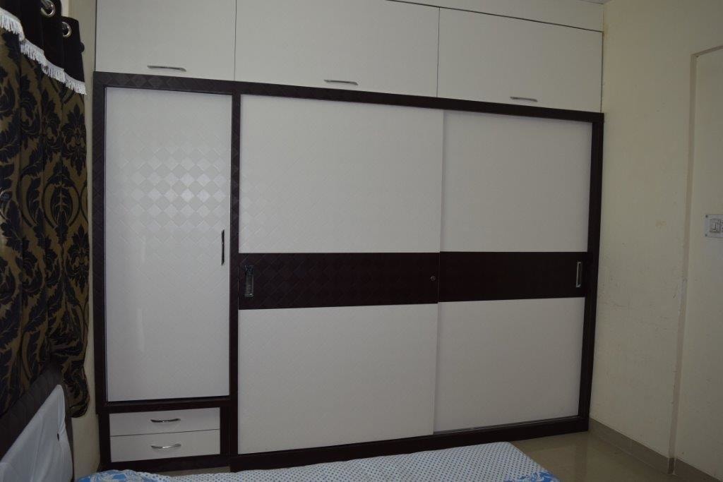 Walnut And White Wood Sliding Cupboard by color's interio Bedroom Contemporary | Interior Design Photos & Ideas