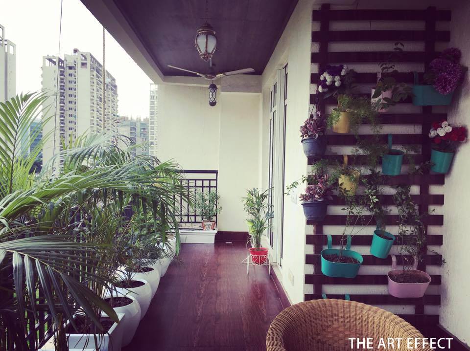 Modern Plantations On Wooden Frame Of A Balcony by The Art Effect