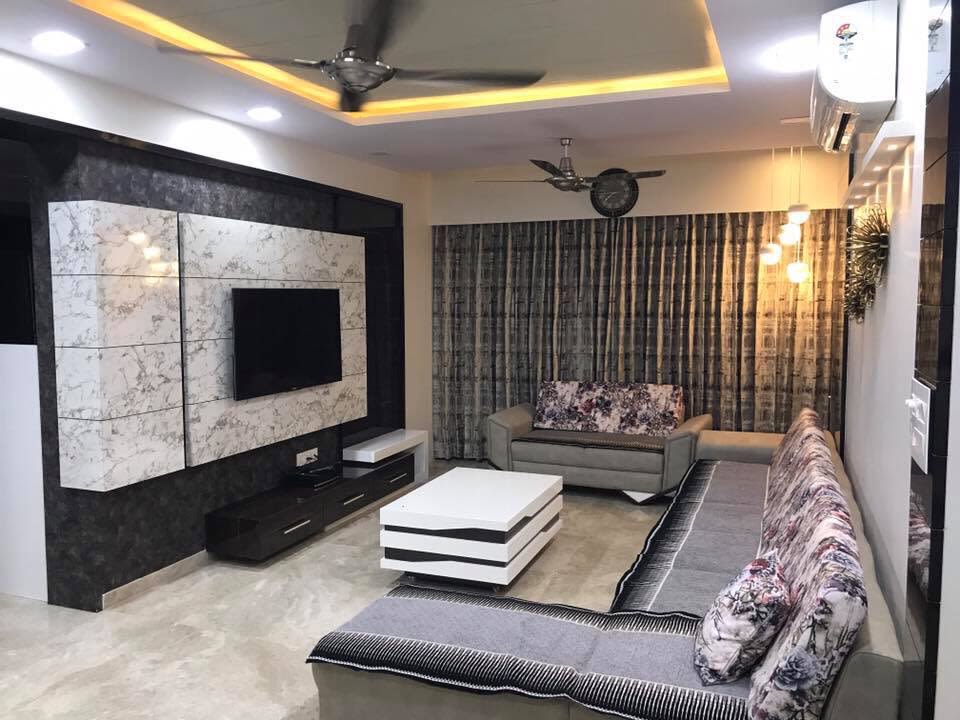 L-Shaped Sofa With Marble Furnishing In Living Room by Jaldeep patel Living-room Contemporary | Interior Design Photos & Ideas