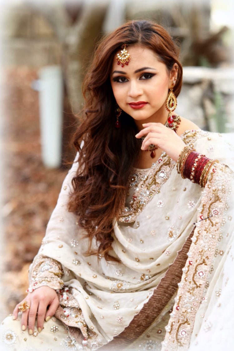 open hairstyle for long hair with soft curlsarchana
