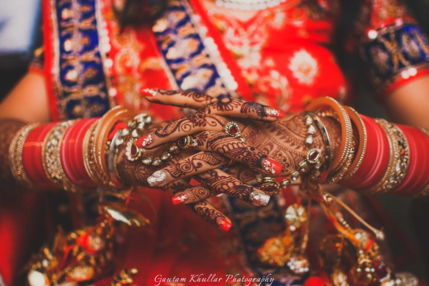 A Close Up Shot Of The Bridal Nails, Jewellery And Mehendi by Gautam Khullar Wedding-photography Bridal-mehendi Bridal-jewellery-and-accessories | Weddings Photos & Ideas