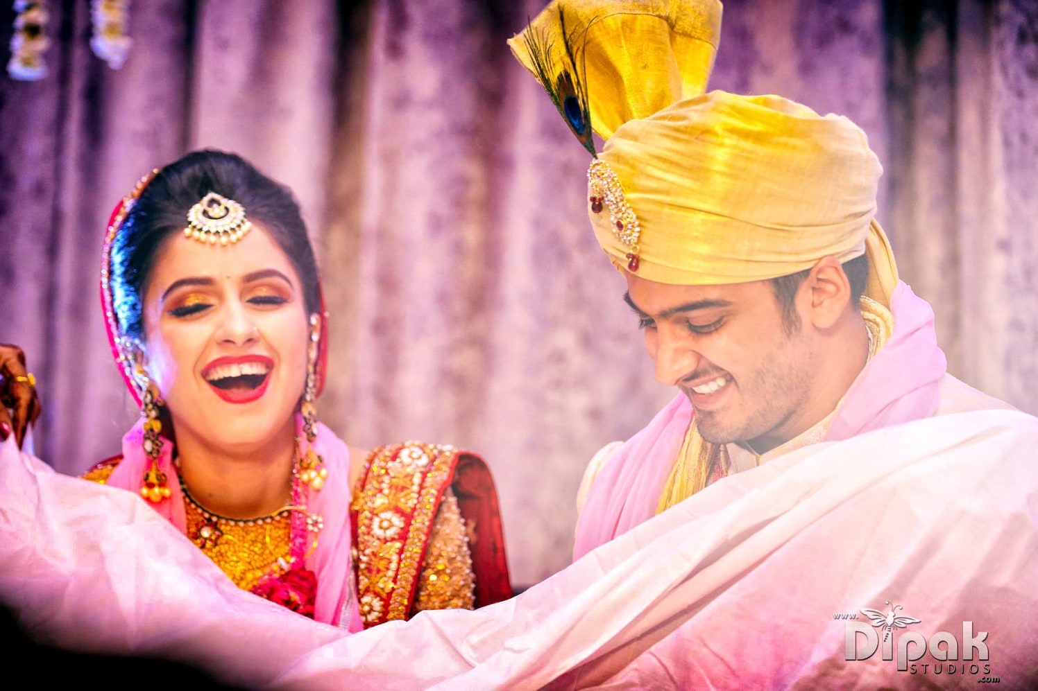 Fun and Frolic Shot Of Bride And Groom On Wedding Day by Kabeer Grover Wedding-photography Groom-wear-and-accessories Bridal-jewellery-and-accessories Bridal-makeup | Weddings Photos & Ideas