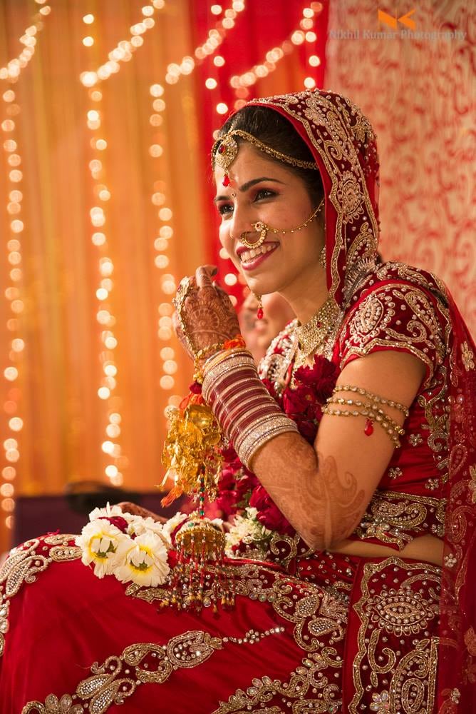 Bride In Red Pendant Kundan Jewellery by Nikhil Kumar Bridal-makeup Bridal-jewellery-and-accessories | Weddings Photos & Ideas