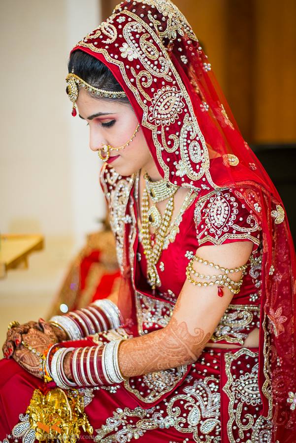 Bride Blushing in red by Nikhil Kumar Bridal-makeup Bridal-jewellery-and-accessories | Weddings Photos & Ideas