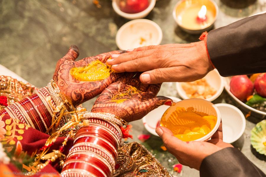 Auspicious Haldi Wedding Ritual by Nikhil Kumar Wedding-photography Bridal-mehendi | Weddings Photos & Ideas