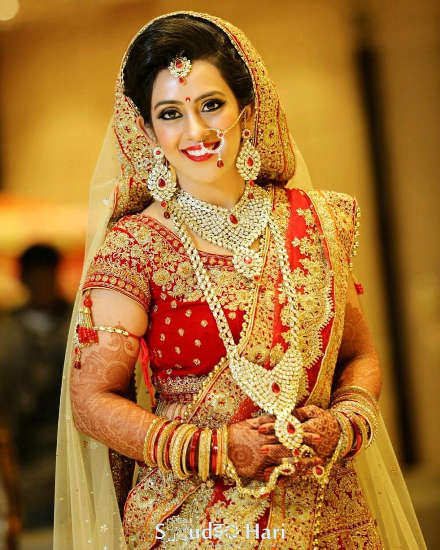 White Jewellery Matching With Red And Golden Lehenga by Anchal Kumar Bridal-makeup Bridal-jewellery-and-accessories | Weddings Photos & Ideas