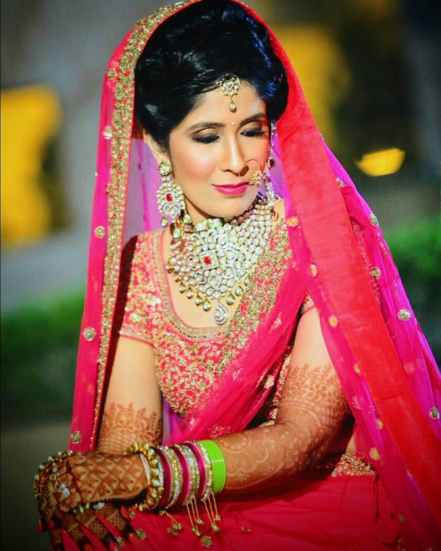 Bride In Pink And Golden Attire With Heavy Kundan Jewellery by Anchal Kumar Bridal-makeup Bridal-jewellery-and-accessories | Weddings Photos & Ideas