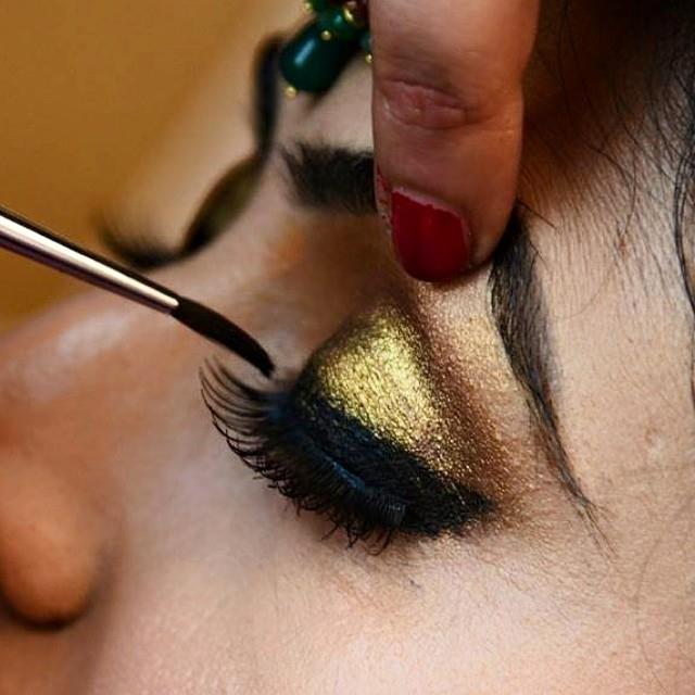Shimmery golden eye shadow by Shruti Sharma Bridal-makeup | Weddings Photos & Ideas