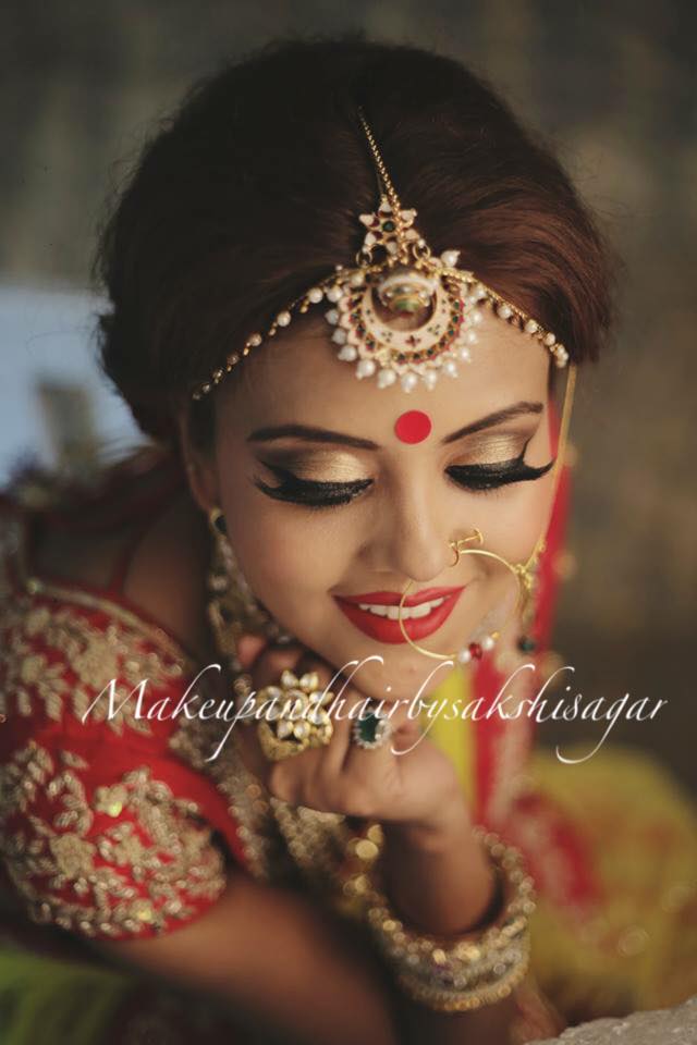 Bindi completing her Bridal look by Sakshi Sagar Bridal-makeup | Weddings Photos & Ideas