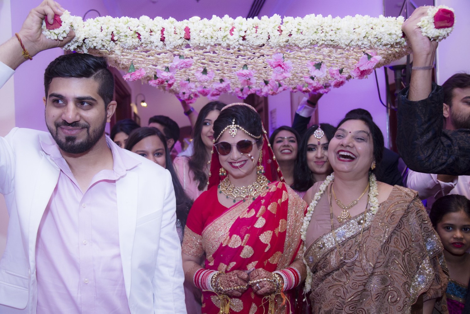 Quirky Bride Entering Wearing Shades by Arpit Gulati Wedding-photography | Weddings Photos & Ideas